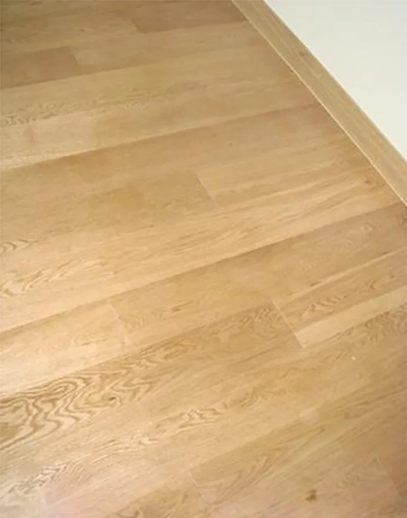 The Crest Serviced Apartments — one-strip engineered white oak · atlanta stain, original project photograph 1