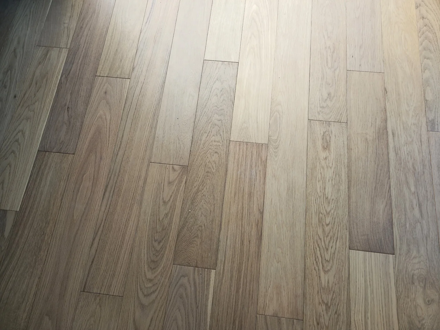 Daya Residence — one-strip engineered white oak, original project photograph 1