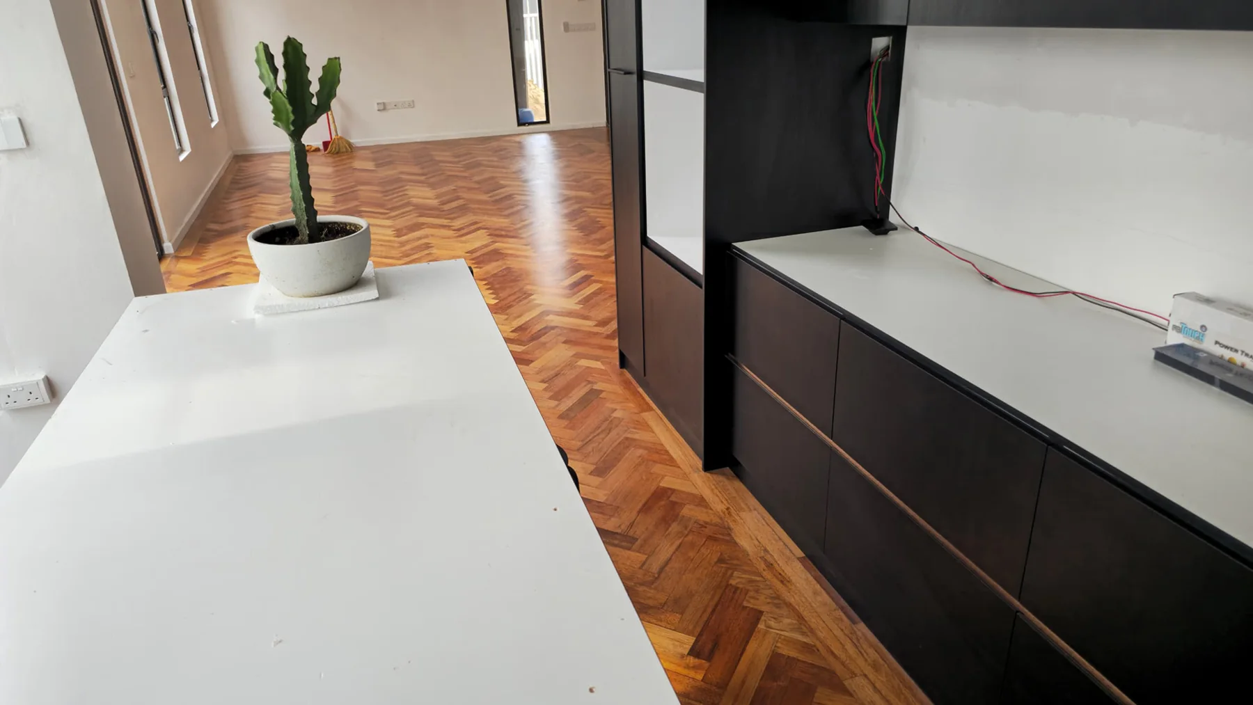 Private Residence at Ecohill — solid merbau · herringbone, original project photograph 1