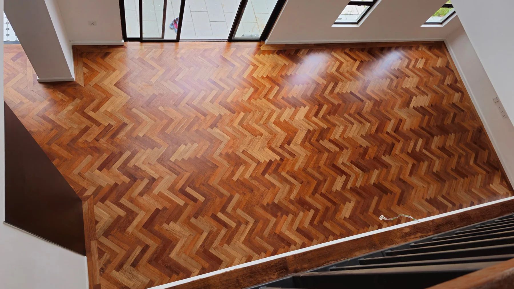 Private Residence at Ecohill — solid merbau · herringbone, original project photograph 5