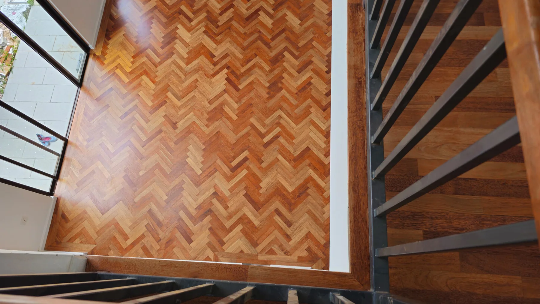 Private Residence at Ecohill — solid merbau · herringbone, original project photograph 6