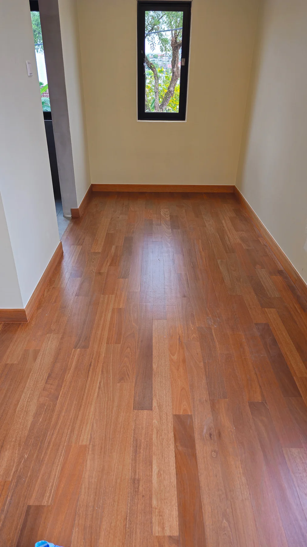 Residential at SS2 — solid red balau flooring, original project photograph 1