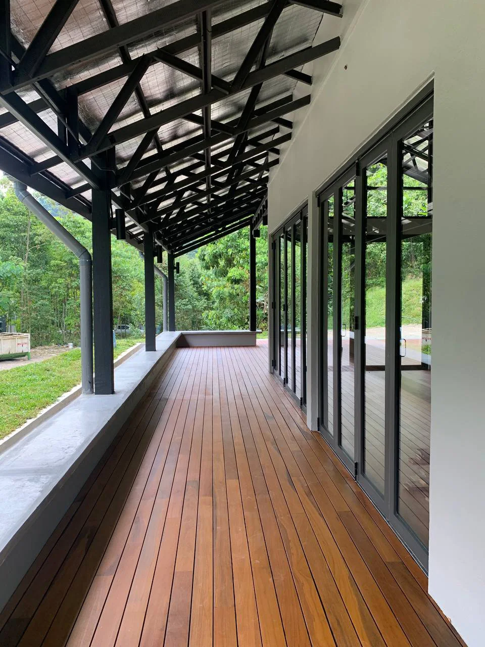 Residential at Ukay Perdana — chengal decking & solid red balau flooring, original project photograph 1
